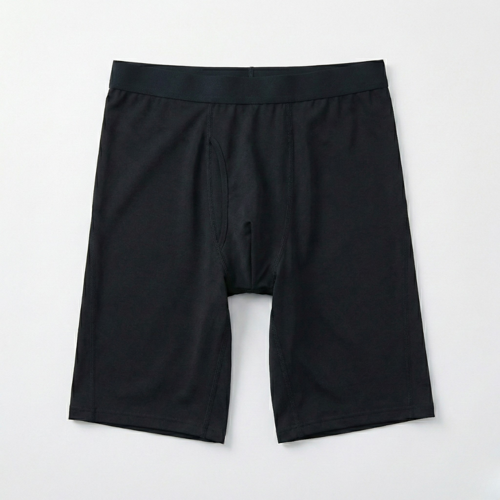 Short compression homme à plat
